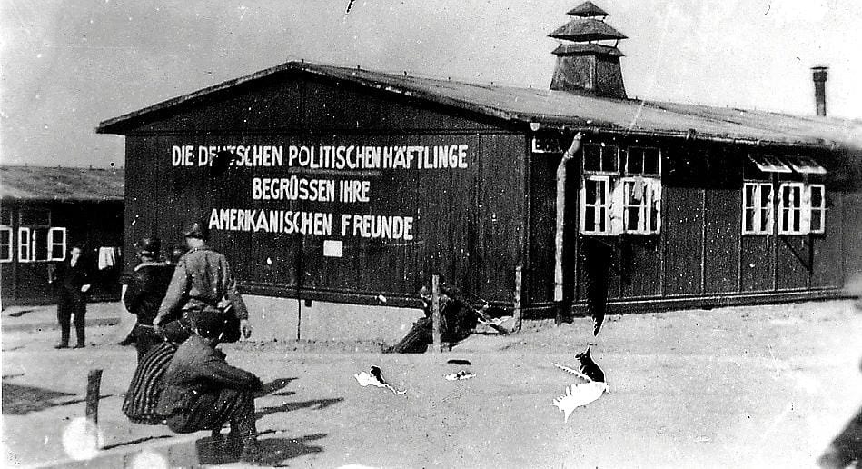 The Buchenwald camp during its liberation.  The painted phrase reads: 